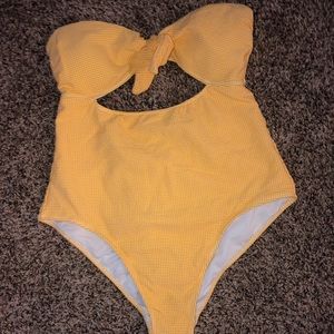 Yellow strapless one-piece swimsuit